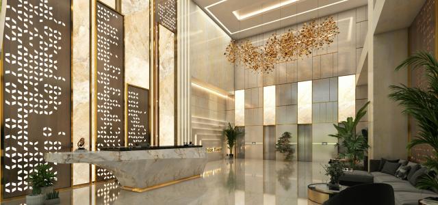 Modern lobby with marble reception desk and elevators by Aalo Lens courtesy of Unsplash.